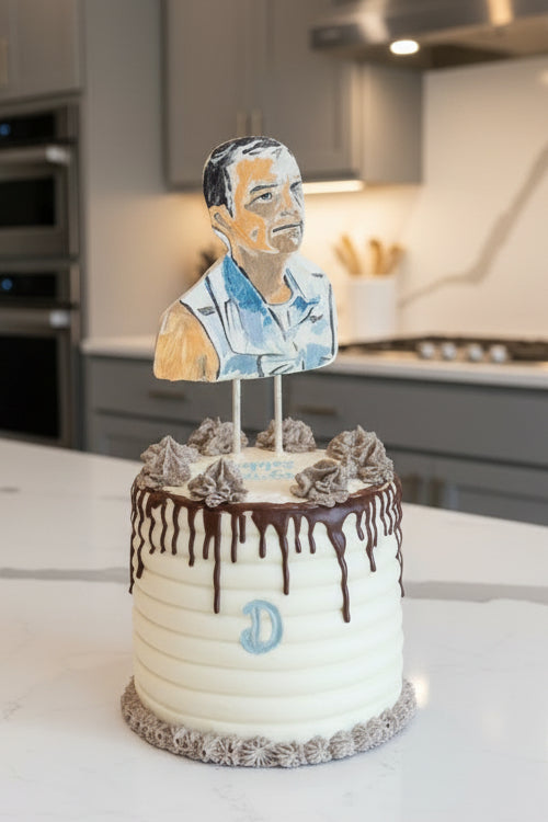 birthday cake with a painted cookie topper, cookies and cream frosting